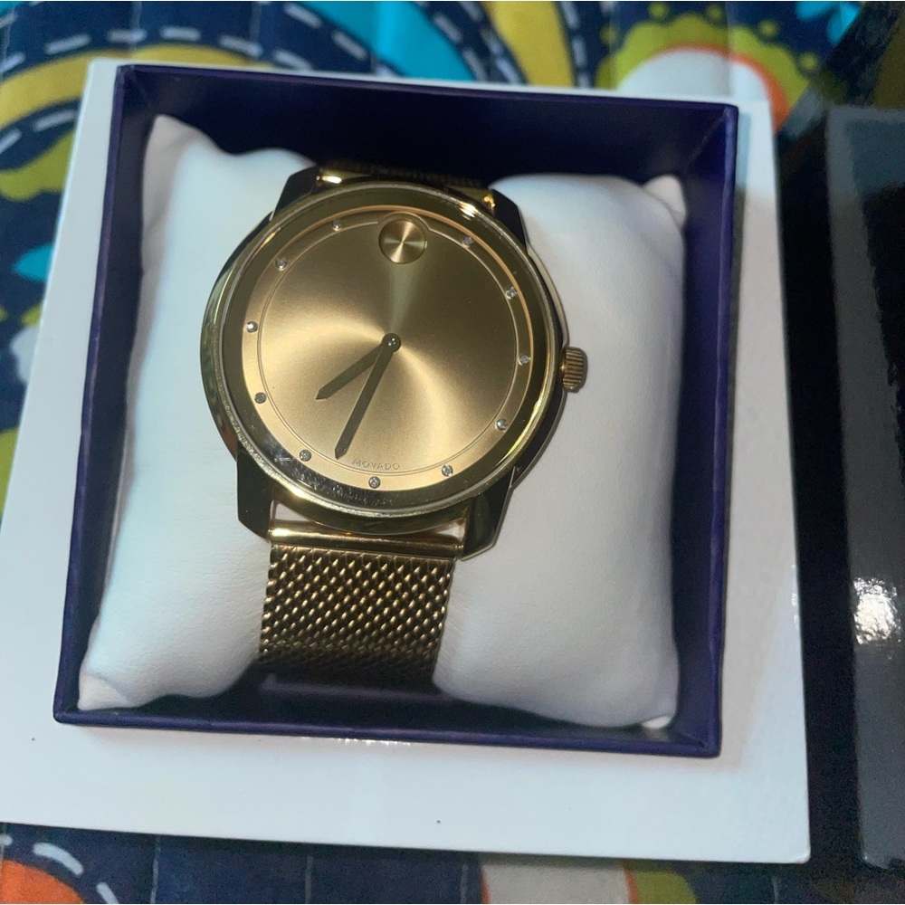Movado gold tone watch